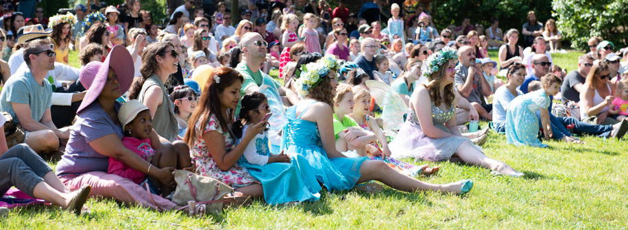 children and adults at outdoor event